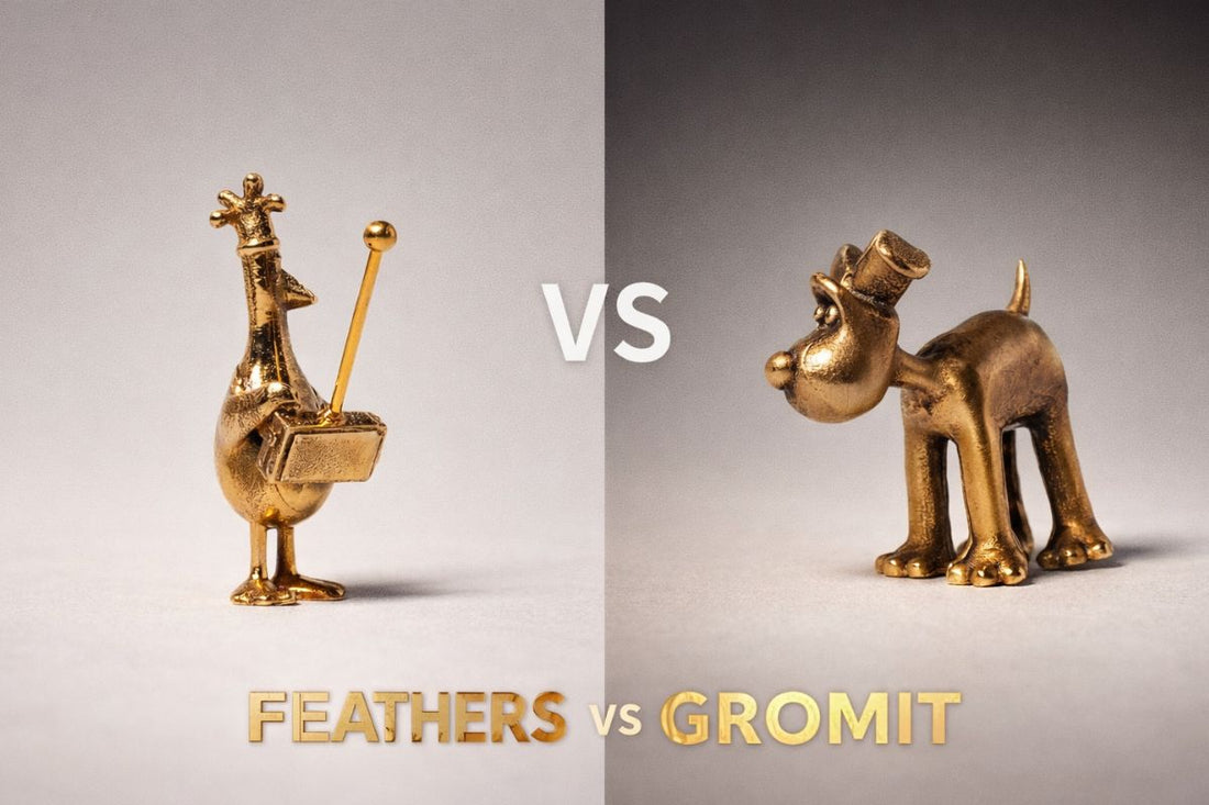 Licensed To Charm Feathers vs Gromit blog image featuring Feathers McGraw and Gromit bronze figurines in a face-off composition on a neutral background.