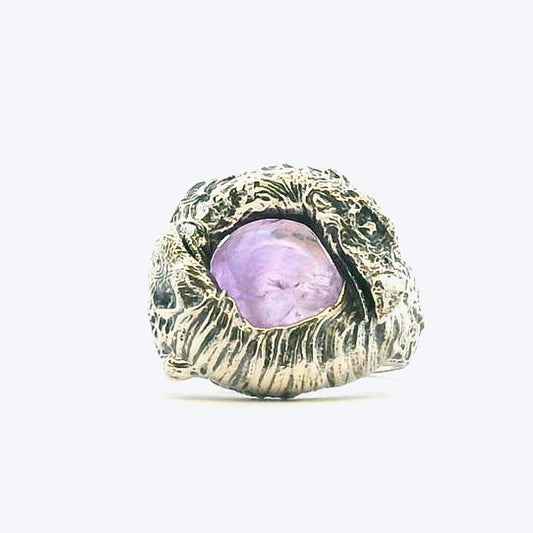 Close-up front view of the Dark Crystal Skeksis Ring showing the central amethyst stone set in sculpted recycled silver.