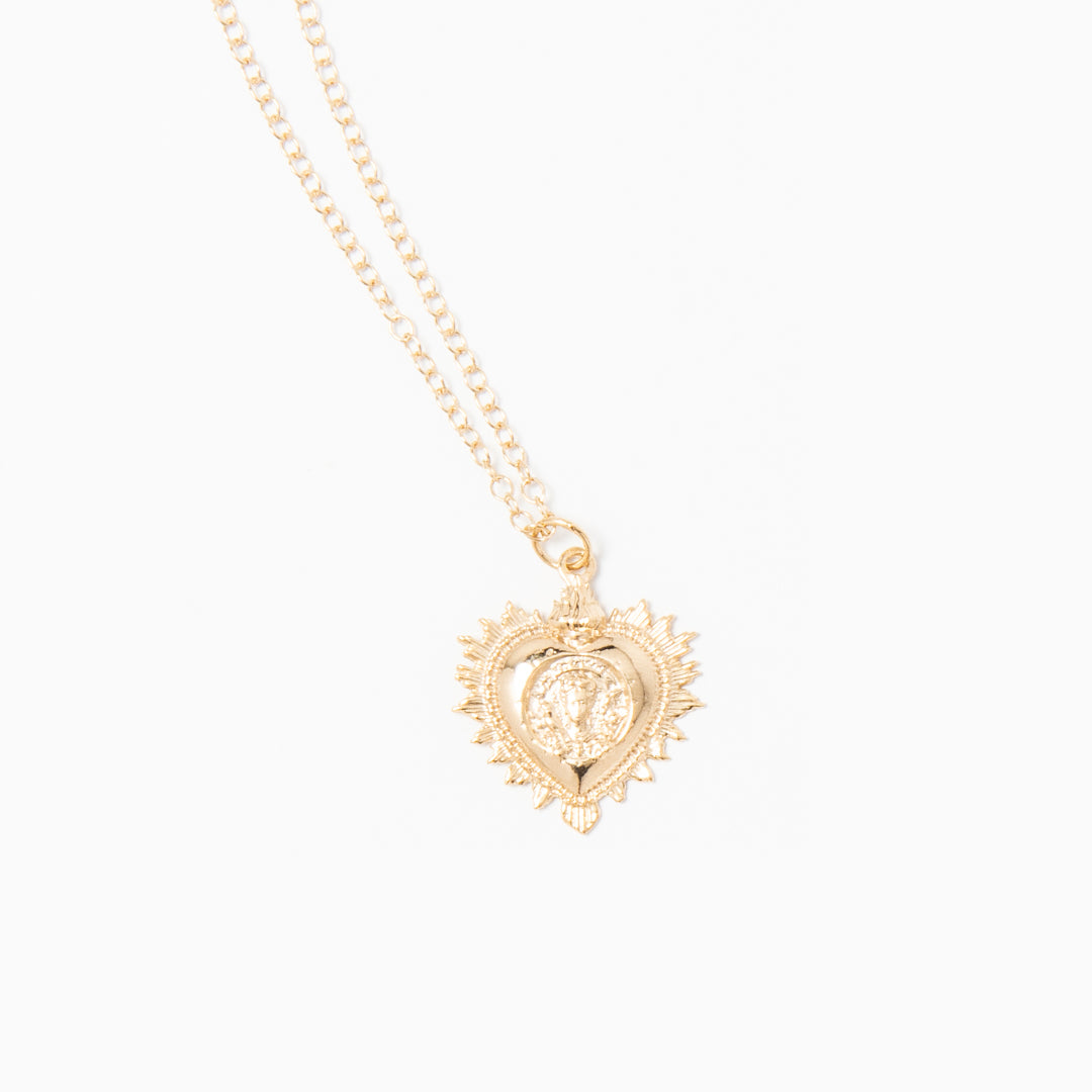 18ct gold vermeil Frida Kahlo Viva La Vida Small Heart Necklace, featuring an intricately detailed sacred heart design with floral accents and Frida’s iconic portrait.