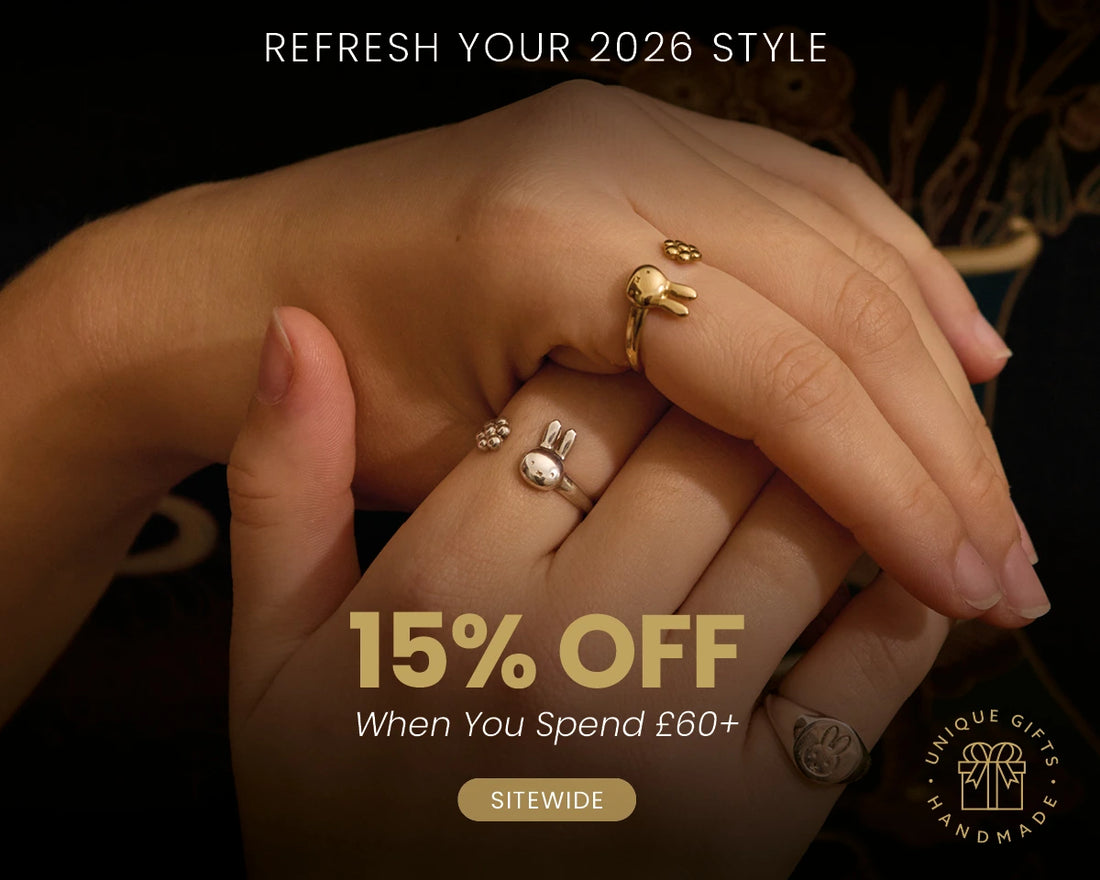 Licensed To Charm - Hands wearing gold and silver character rings from Licensed To Charm, promoting 15% off jewellery when you spend £60+, Refresh Your 2026 Style campaign.