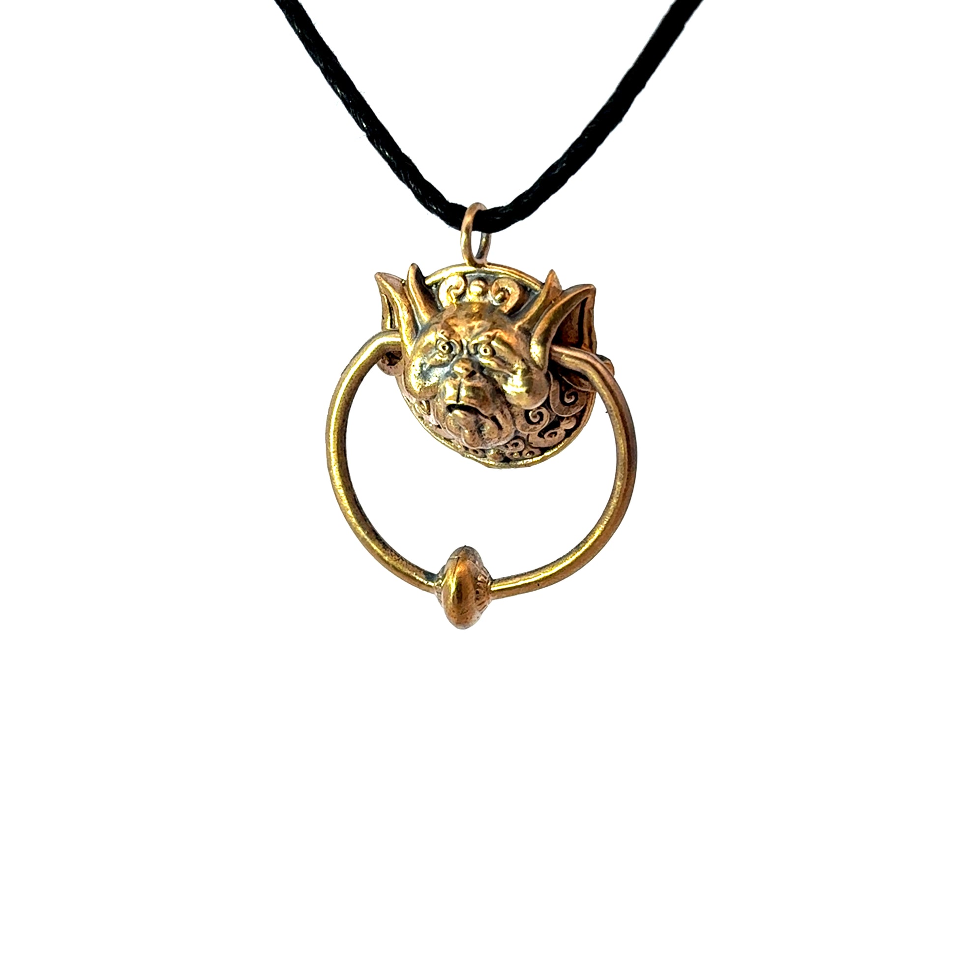 Licensed To Charm Labyrinth Right Door Knocker bronze necklace shown from an angled side view on a black cord
