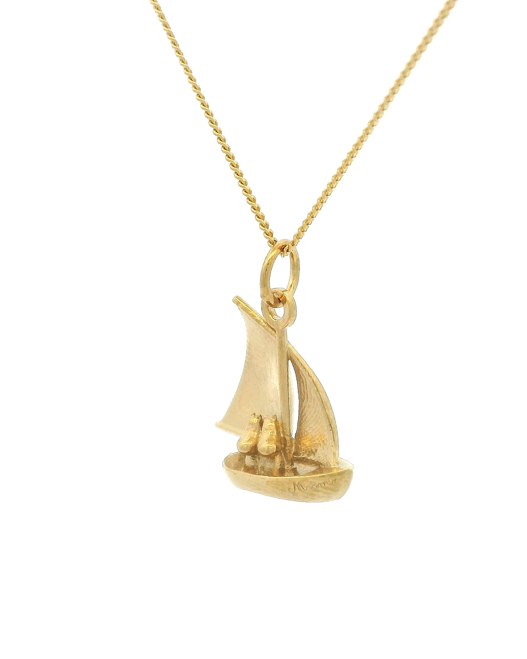 Licensed To charm Moomins Gold sailboat pendant on a chain against a white background