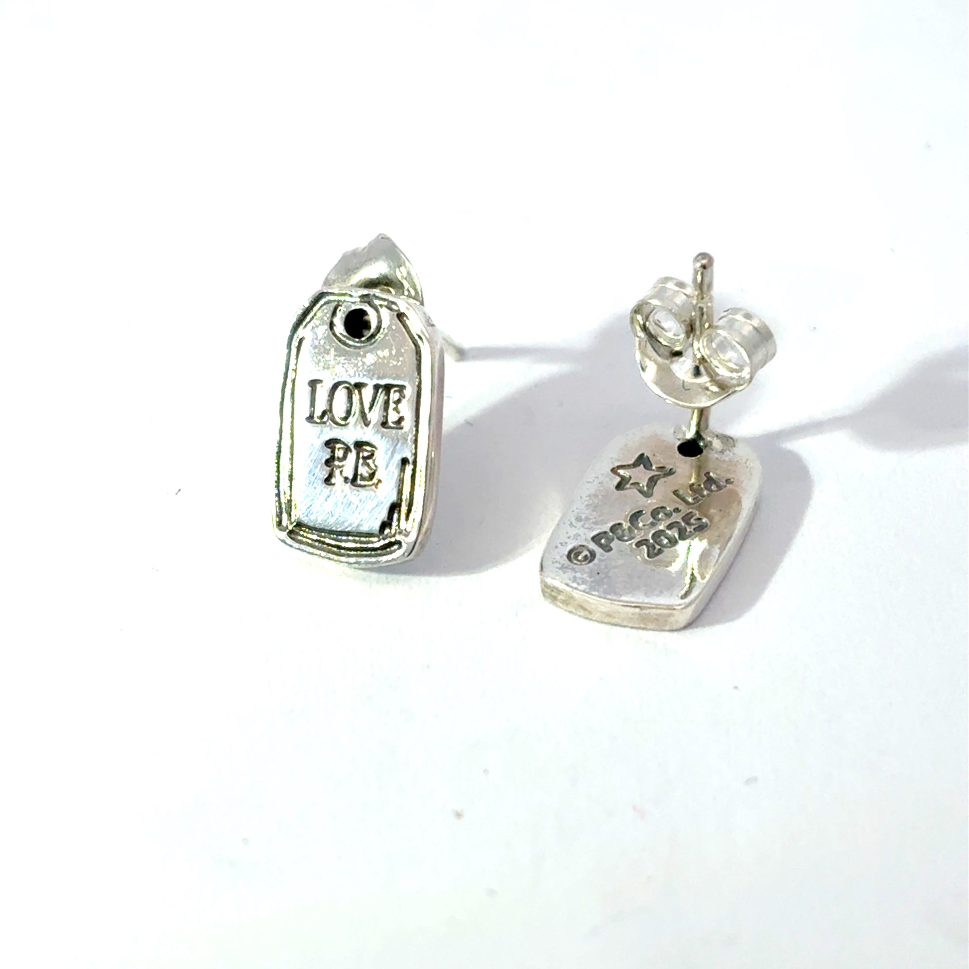 Licensed To Charm Sterling Silver Paddington Love PB Luggage Tag Earrings on white background