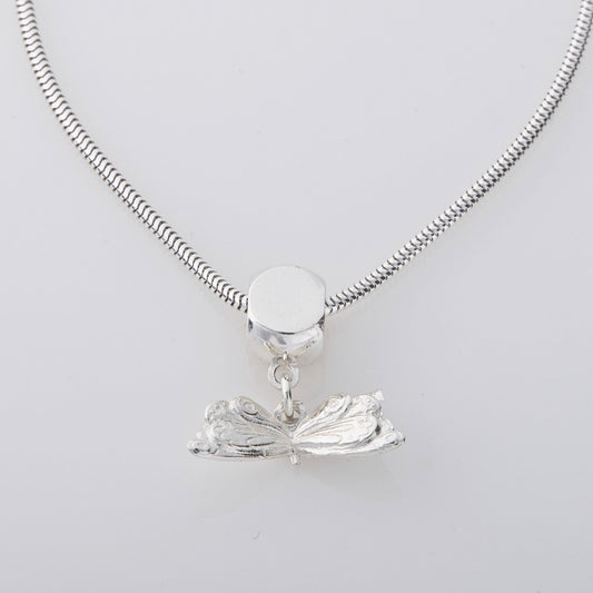 Licensed To Charm Handmade Very Hungry Caterpillar Butterfly Dangle Necklace in sterling silver, featuring an etched butterfly charm inspired by Eric Carle’s classic children’s book. A whimsical jewellery gift for all ages.