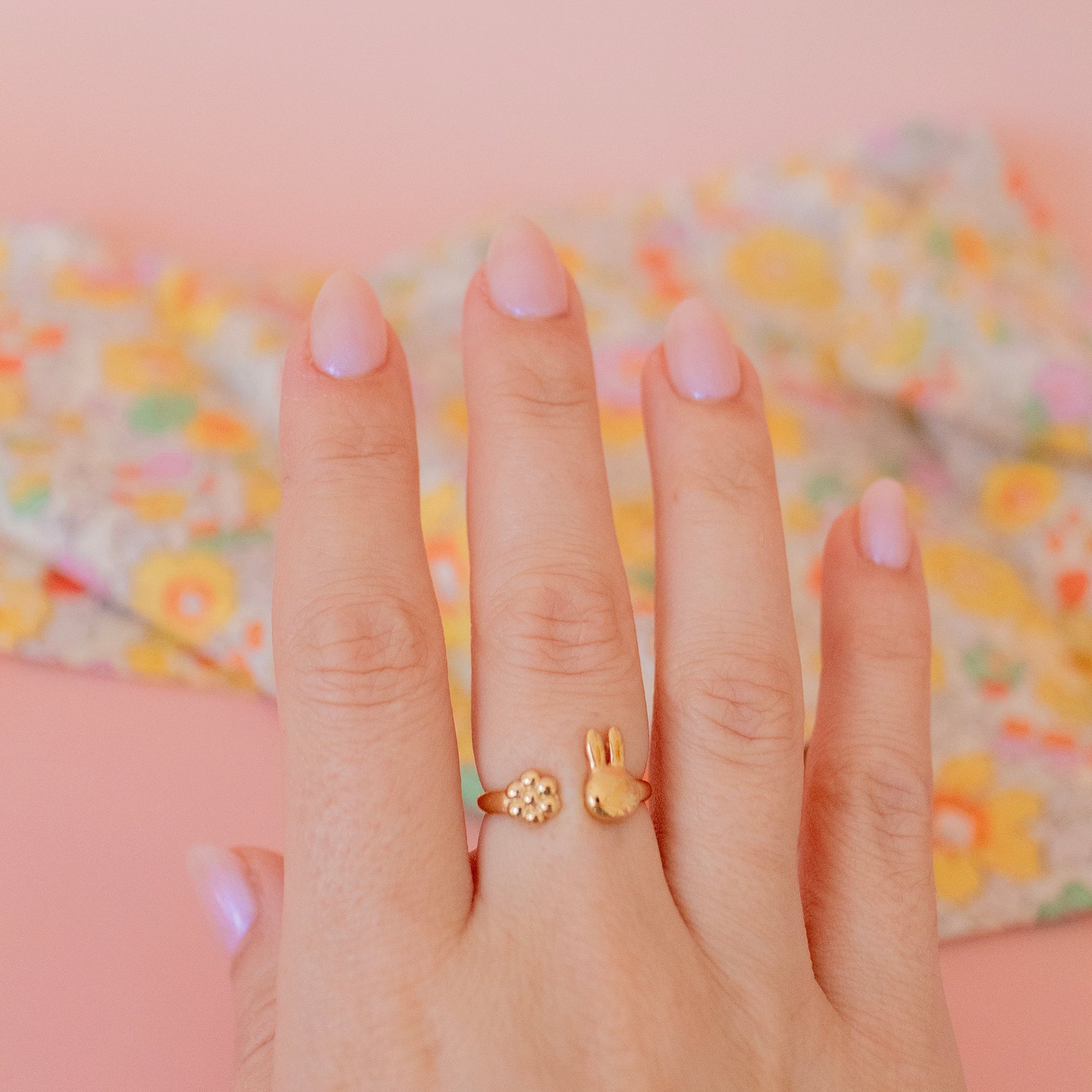 Miffy gold vermeil daisy ring – officially licensed Miffy jewellery, handmade in the UK, adjustable ring gift for collectors and fans worn on models fingers.