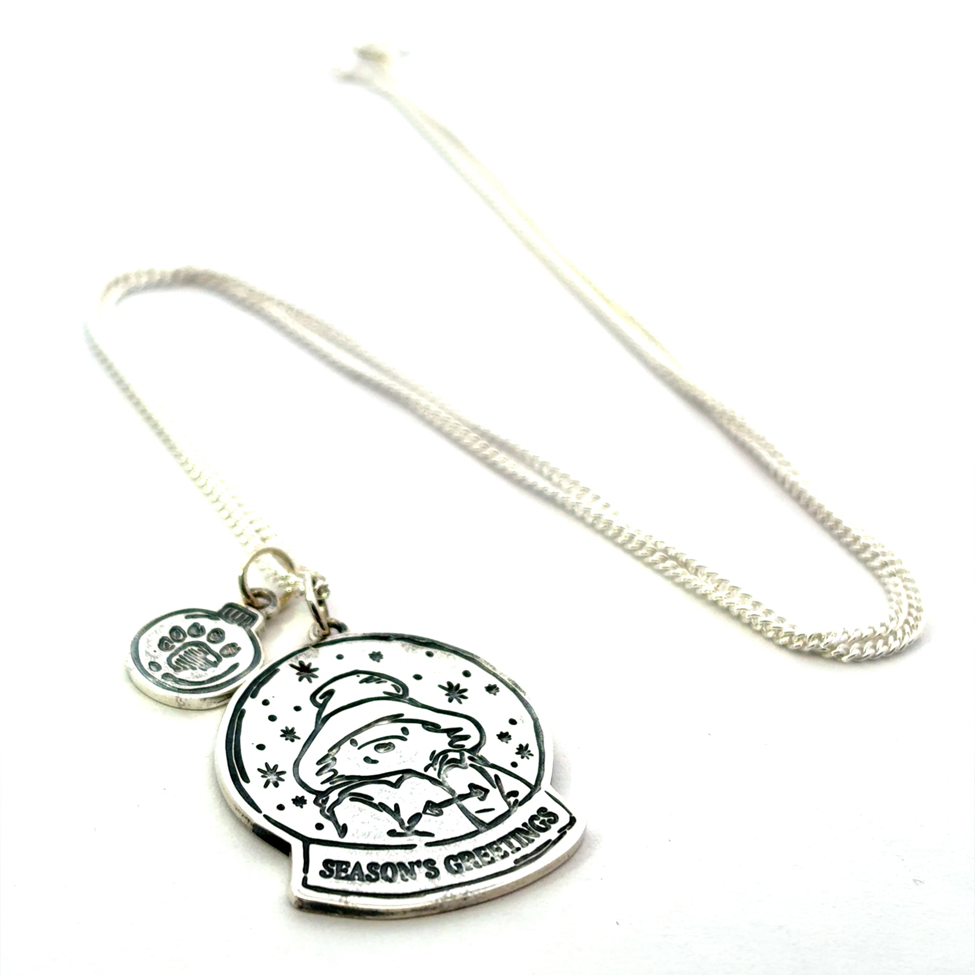 Licensed To Charm Paddington Christmas snowglobe necklace in sterling silver flat lay