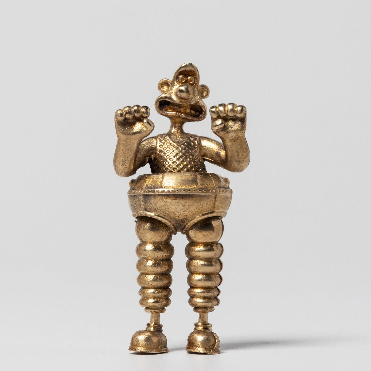 Wallace Wrong Trousers Bronze Figurine, handcrafted with antique patina. A must-have collectible for Wallace & Gromit fans.