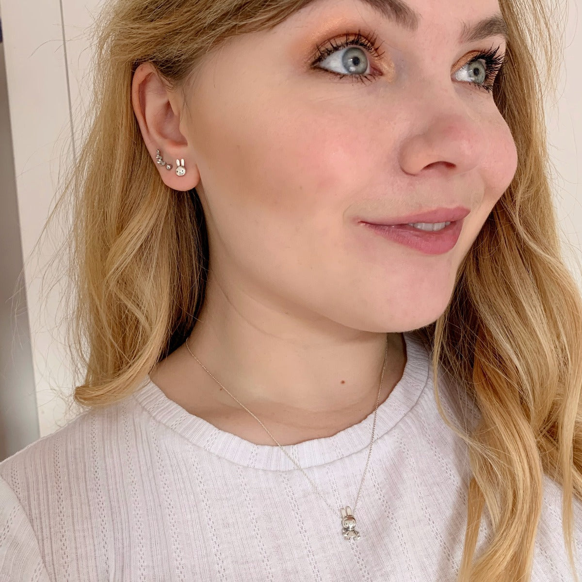 Licensed To Charm Winter Miffy Necklace in Sterling Silver worn on model with white t-shirt