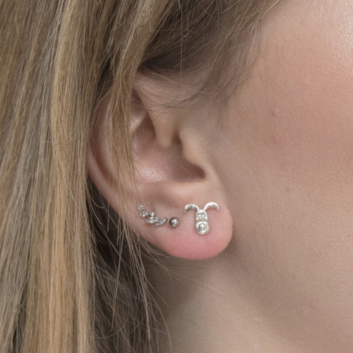 Gromit Stud Earrings in sterling silver, celebrating Wallace & Gromit with whimsical charm. Ideal for gifting and collectors.