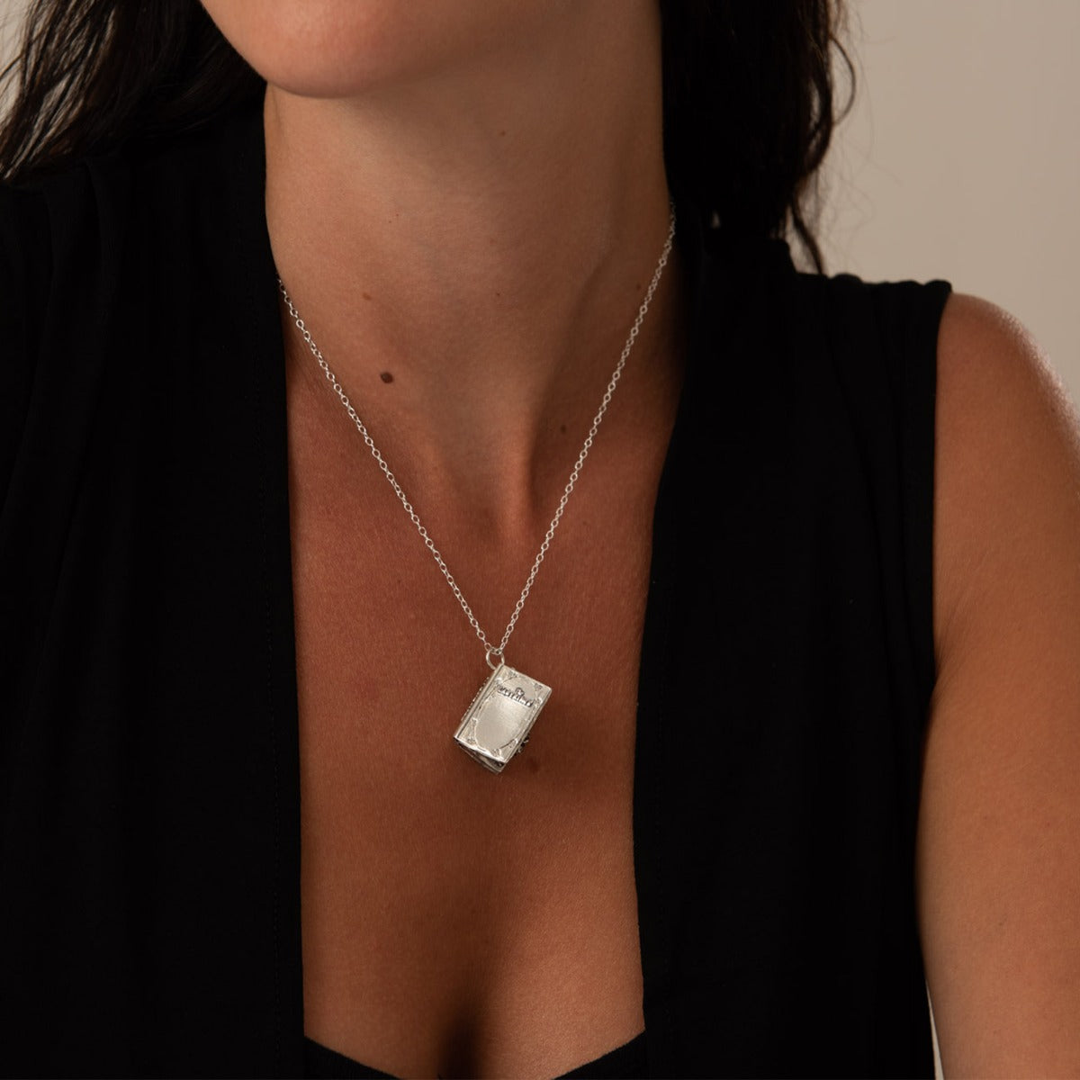 Licensed To Charm Labyrinth Book Charm Necklace in sterling silver, worn by model, officially licensed collector’s gift jewellery.