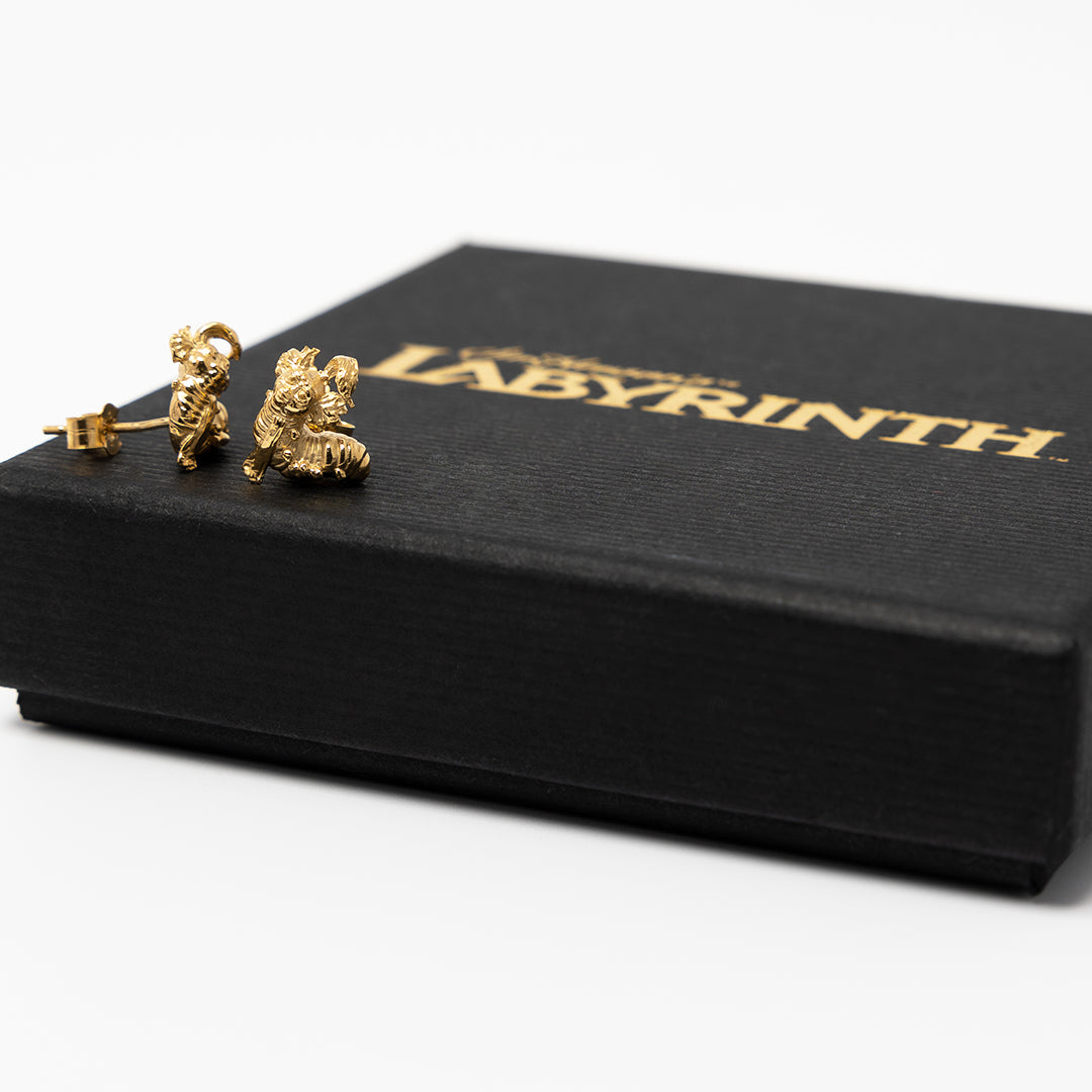 Labyrinth Worm Earrings displayed in gift box with themed props, perfect for gifting or fans of Labyrinth movie merchandise.