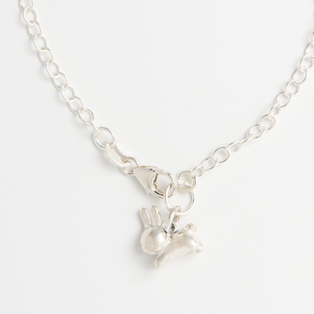 Licensed To Charm Close-up of sterling silver Miffy Leaping Rabbit charm bracelet, handmade in the UK.