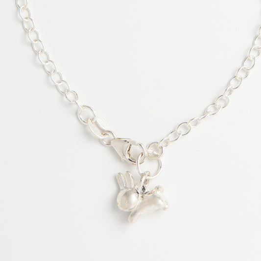 Licensed To Charm Close-up of sterling silver Miffy Leaping Rabbit charm bracelet, handmade in the UK.