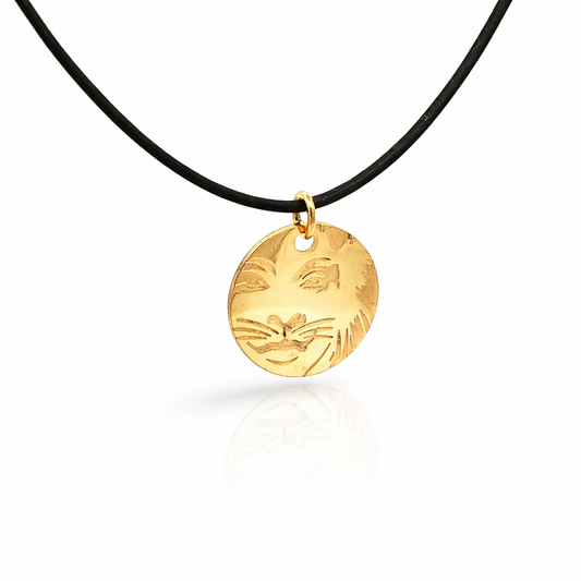Licensed to charm Cats Rum Tum Tugger gold plate leather necklace with etched character detail on black leather cord