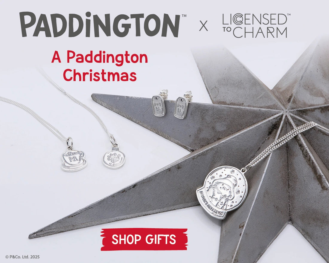 Licensed to charm christmas Jewellery collection with Paddington Bear theme on a white Christmassy background