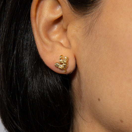 Model wearing the Labyrinth Worm Stud Earrings with casual outfit, showing off the playful, nostalgic movie-inspired design