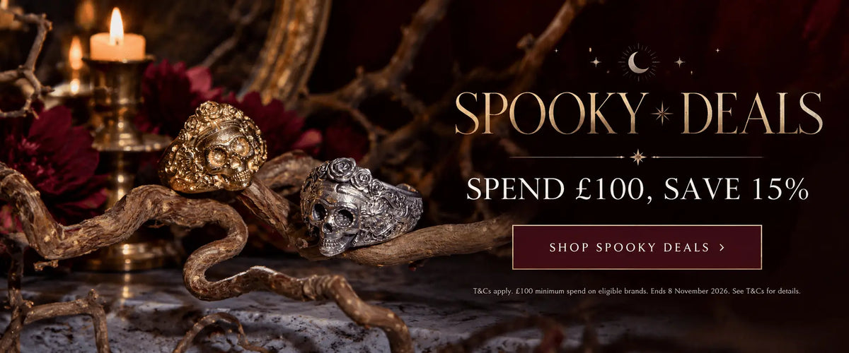 Spooky Deals at Licensed To Charm – gold and silver Frida Kahlo skull rings displayed on twisted branches. Spend £100 and save 15% on eligible jewellery.