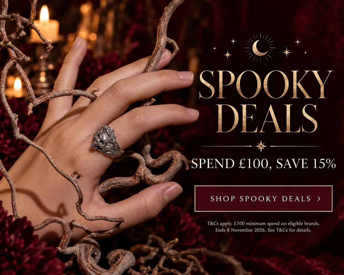 Spooky Deals at Licensed To Charm – gold and silver Frida Kahlo skull rings displayed on twisted branches. Spend £100 and save 15% on eligible jewellery.