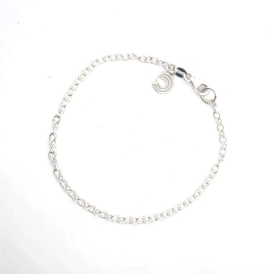 Sterling Silver Fine Trace Chain Bracelet with Licensed To Charm tag, perfect for adding charms or wearing alone, presented in a signature gift box.