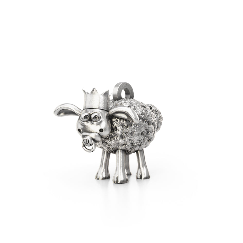 Sterling Silver Timmy the Sheep charm wearing a party hat and holding a dummy.