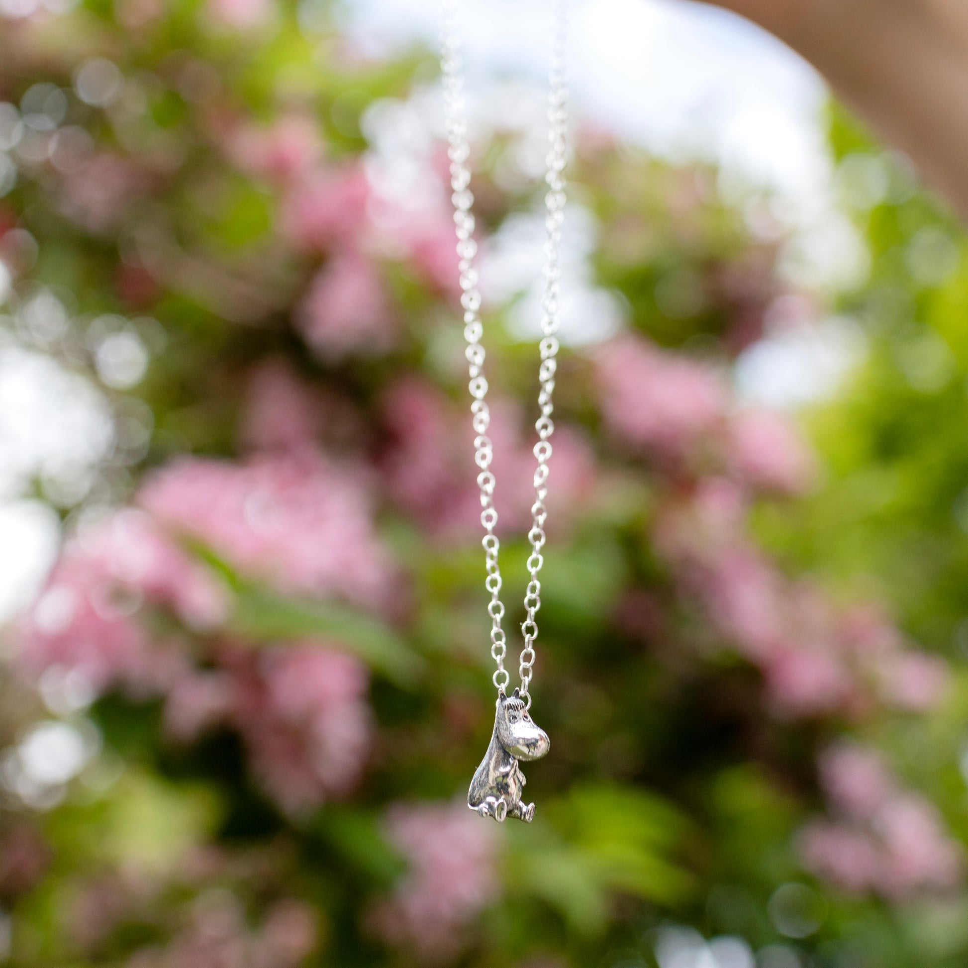 Sterling silver Moomintroll Necklace featuring the cheerful character from Moominvalley. A playful and sustainable accessory