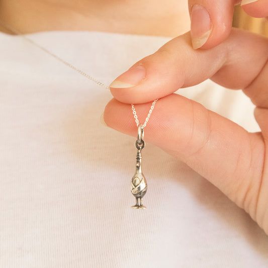 Sterling Silver Feathers McGraw Charm, inspired by The Wrong Trousers, with intricate detailing. Perfect for necklaces and charm bracelets.