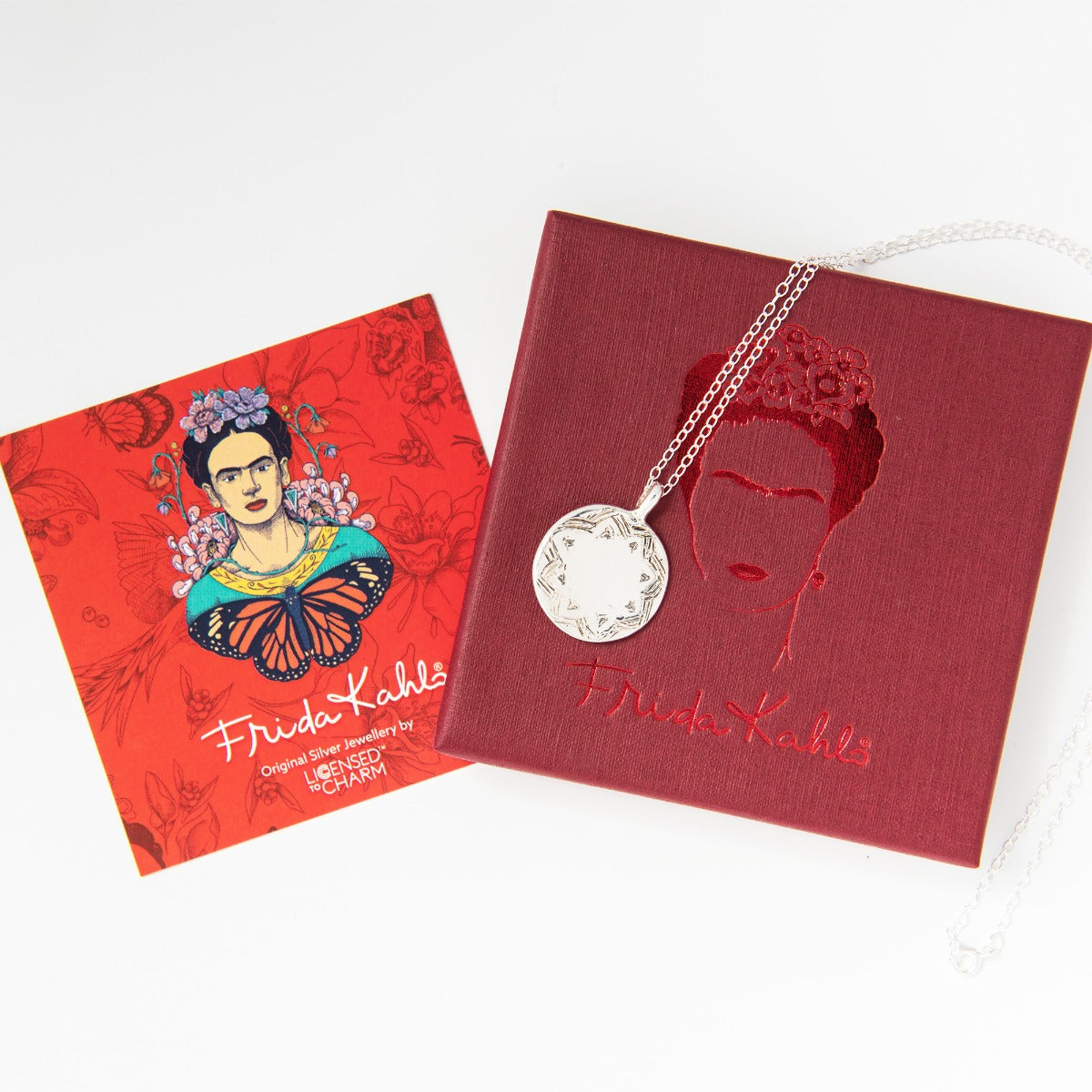 Frida Kahlo disc necklace presented with branded Frida Kahlo jewellery box