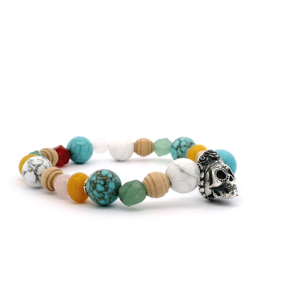Side view of Frida Kahlo gemstone stretch bracelet with sugar skull charm