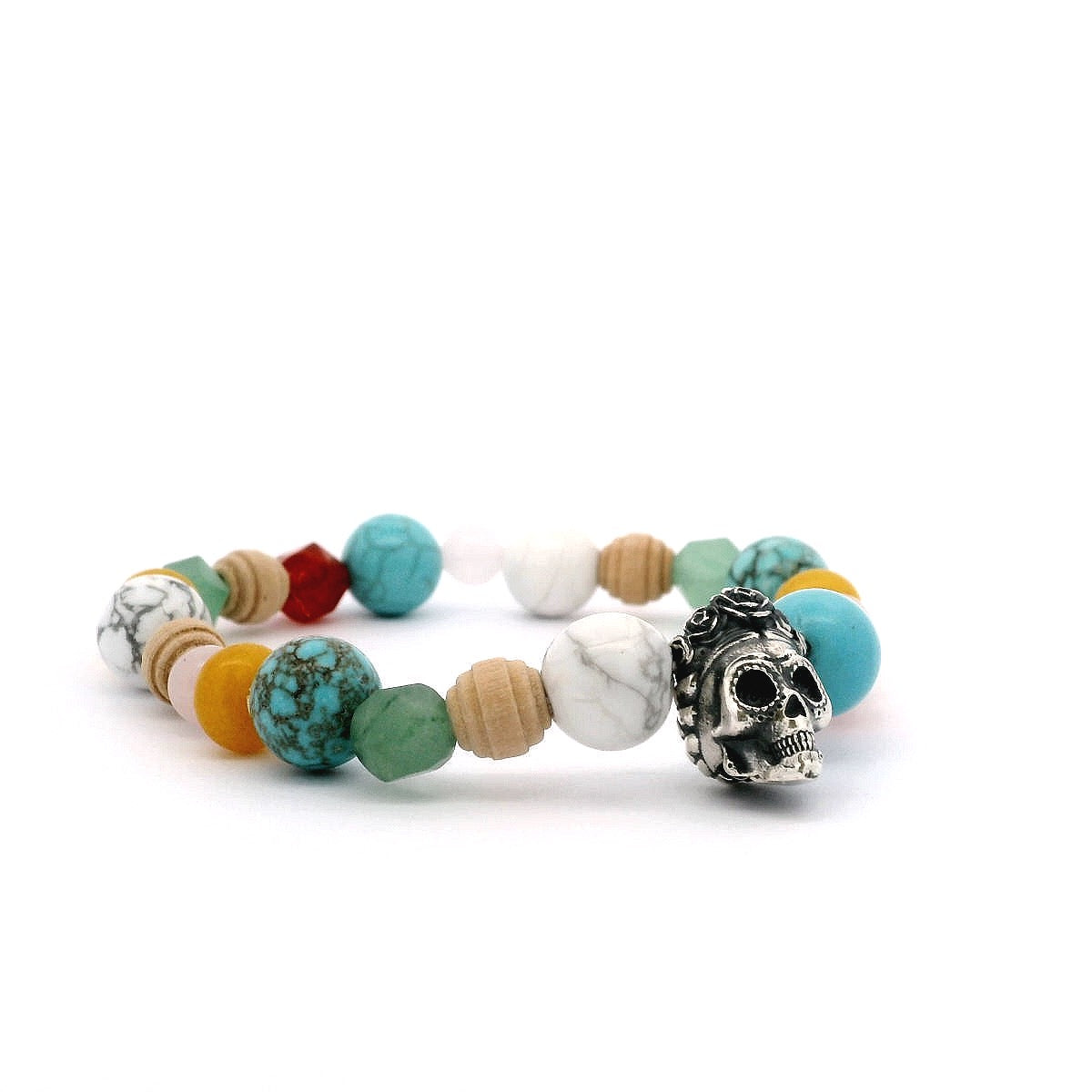 Side view of Frida Kahlo gemstone stretch bracelet with sugar skull charm