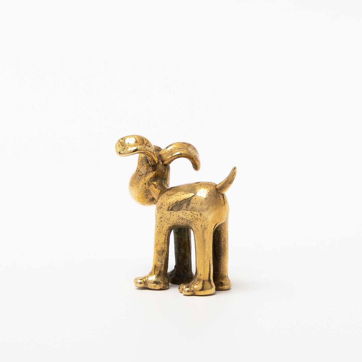 Studio image of the Gromit Miniature Bronze Figurine showing its handmade bronze finish and character detail.