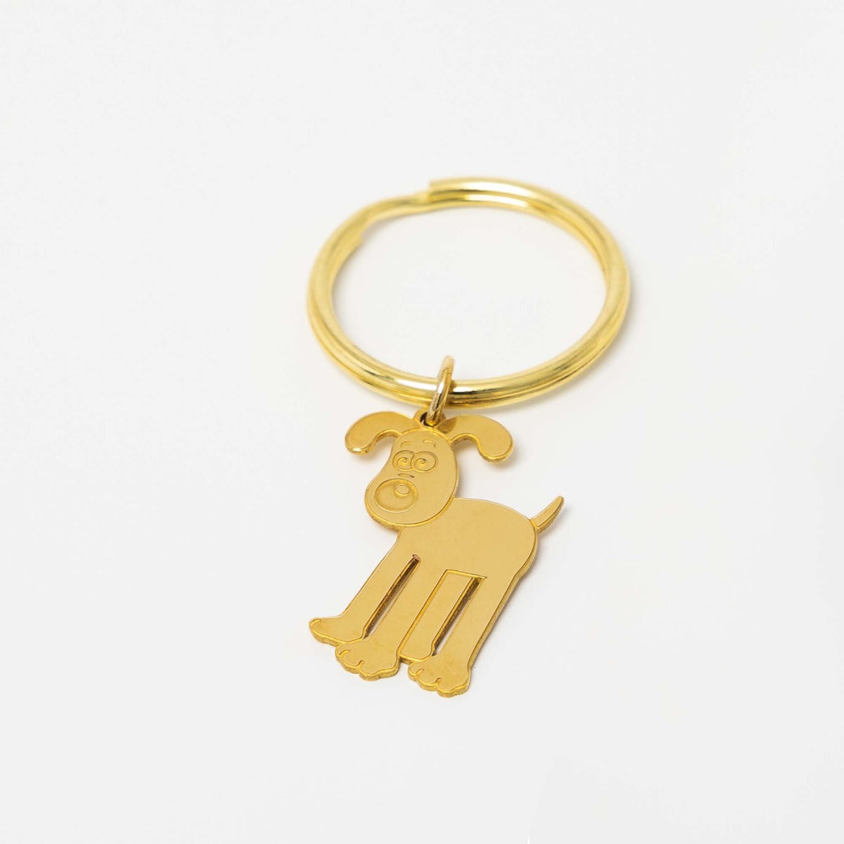 Standing Gromit Keyring with brass split ring, celebrating 30 years of Wallace & Gromit. A playful and detailed accessory for fans