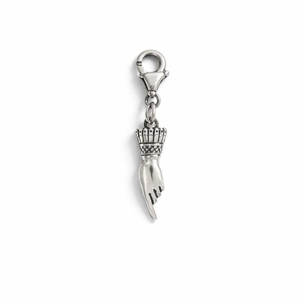 Licensed To Charm Frida Kahlo pointing hand charm in sterling silver with lobster clasp, front view on white background
