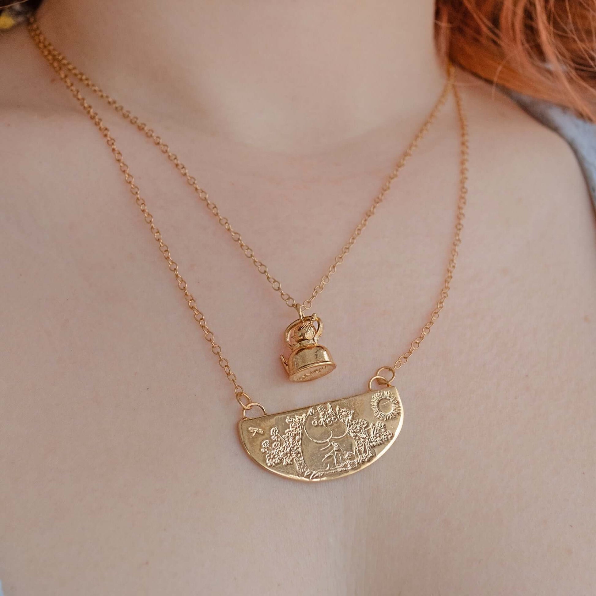 Licensed To Charm Moomin Friends Among Flowers Necklace in 18ct gold vermeil featuring Moomintroll and Snorkmaiden among flowers model wearing with Little My Necklace for a beautiful layered look