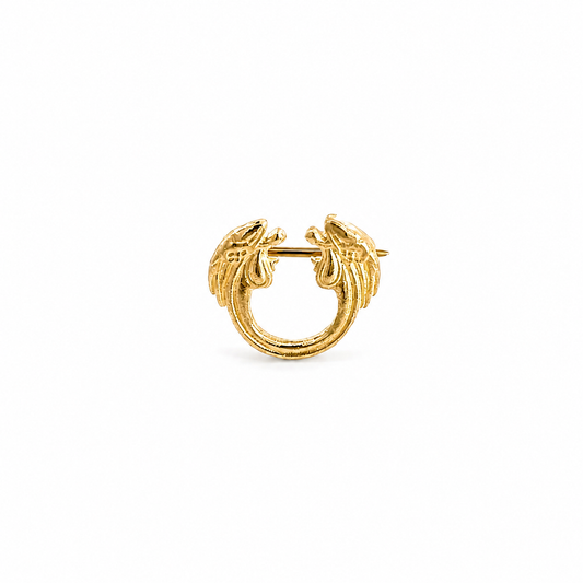 Jesus Christ Superstar 18ct gold vermeil lapel pin brooch with two stylised horse heads on a white background.