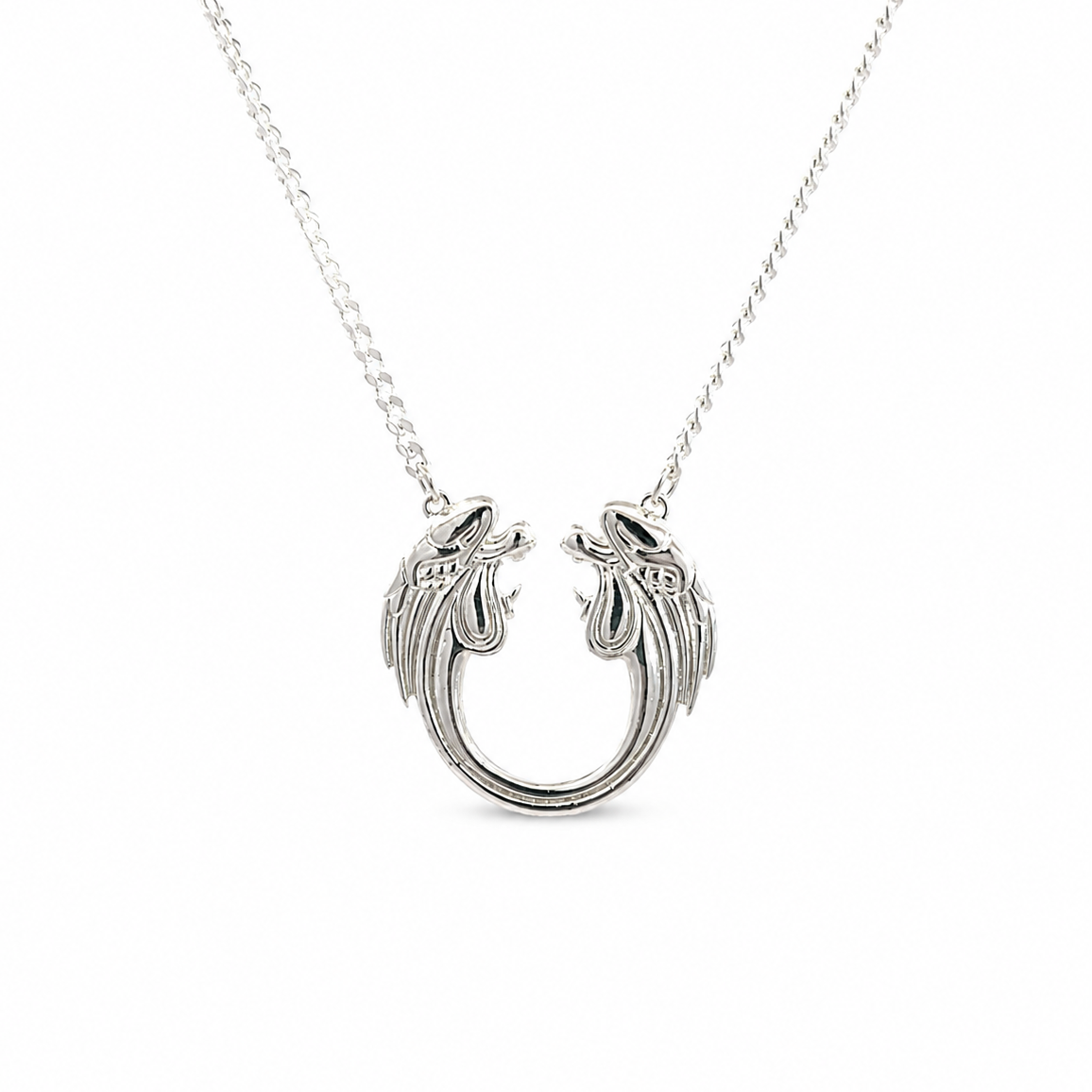 Sterling silver Jesus Christ Superstar logo necklace on a chain, photographed on a clean white background
