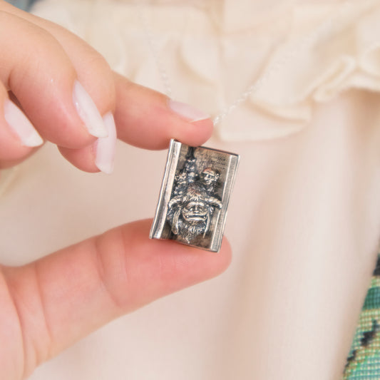 Close-up of Labyrinth Book Charm Necklace in sterling silver showing Ludo, Hoggle, and Sir Didymus.