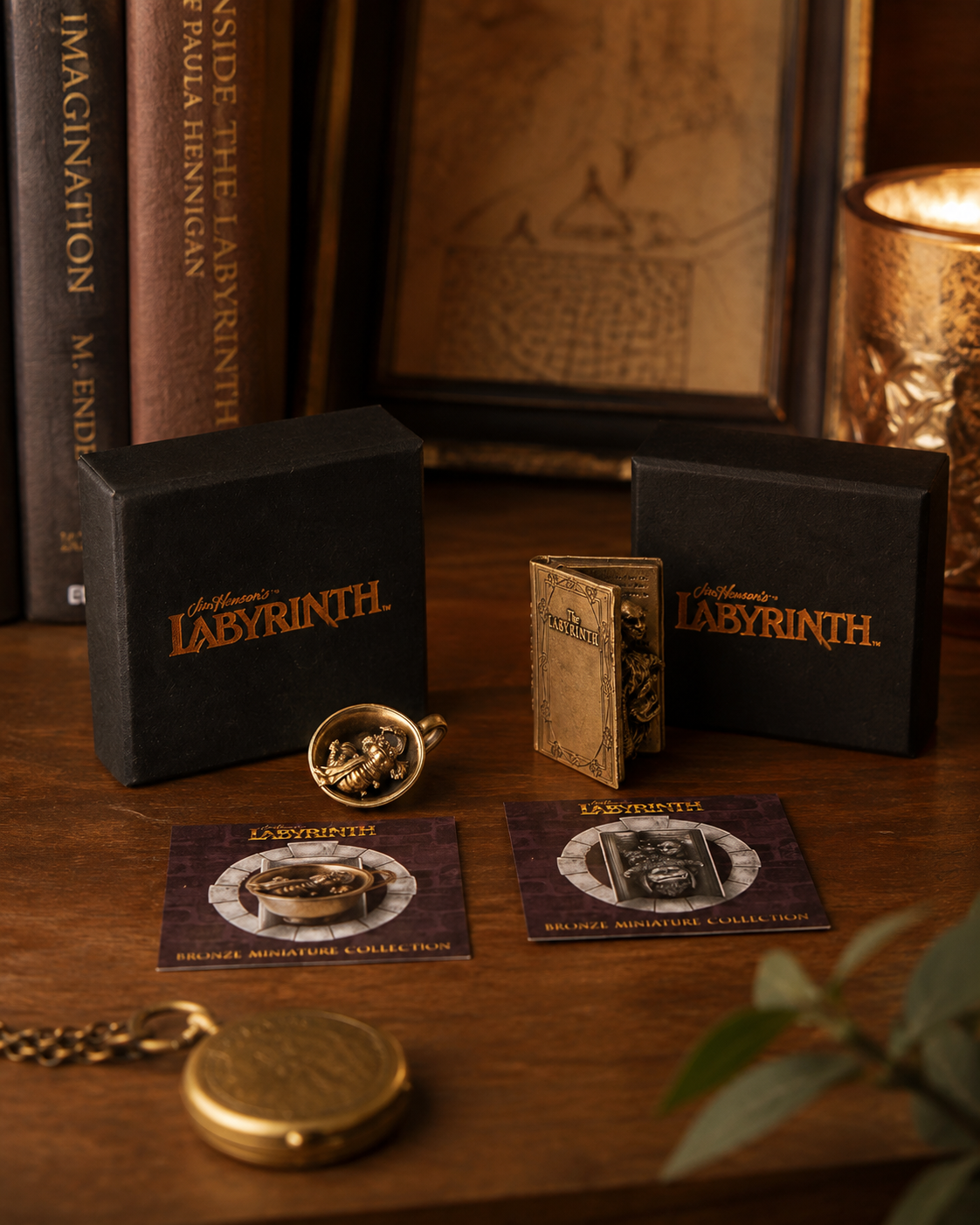 Labyrinth Character Book and Worm in a Cup bronze miniatures presented in premium gift packaging with collector cards.