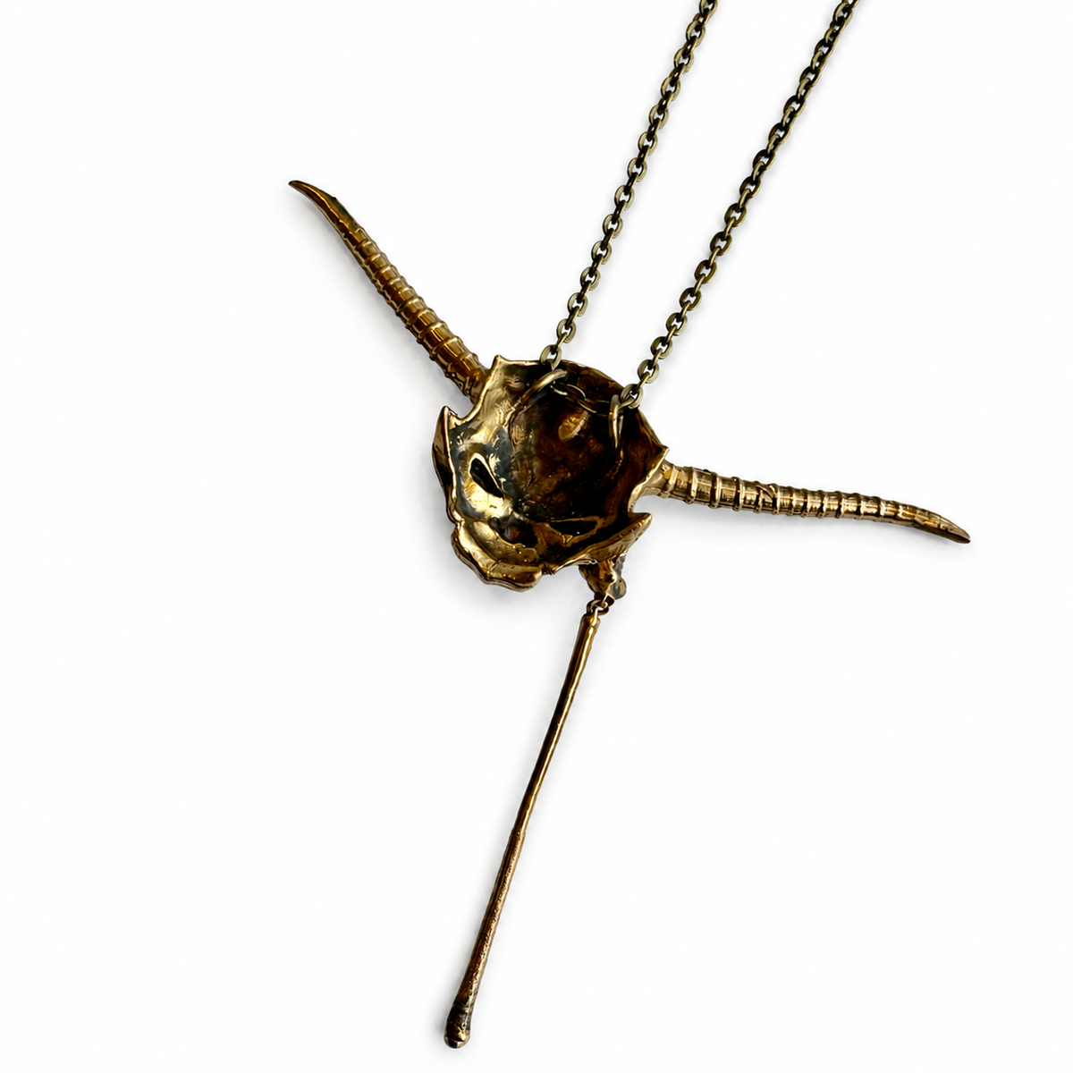 Reverse view of the handmade Labyrinth Goblin King mask bronze necklace and chain attachments.