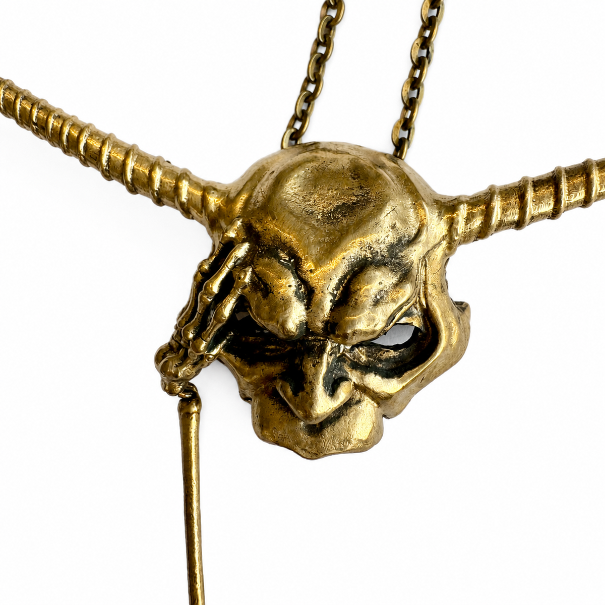 A close-up of the Goblin Kings Mask from labyrinth bronze pendant necklace featuring a horned skull design with a textured, weathered finish, suspended from a matching chain against a plain white background.