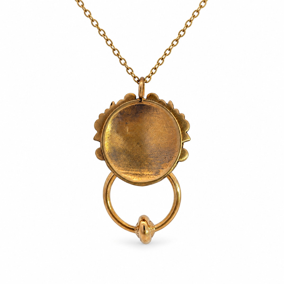 Reverse of the Labyrinth Left Door Knocker Bronze Necklace showing the back of the pendant