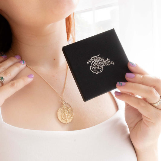 Licensed To Charm 18ct gold vermeil Master Time Spiral Necklace inspired by The Dark Crystal, featuring intricate spirals and a central triangle symbolising Thra’s mystical forces.