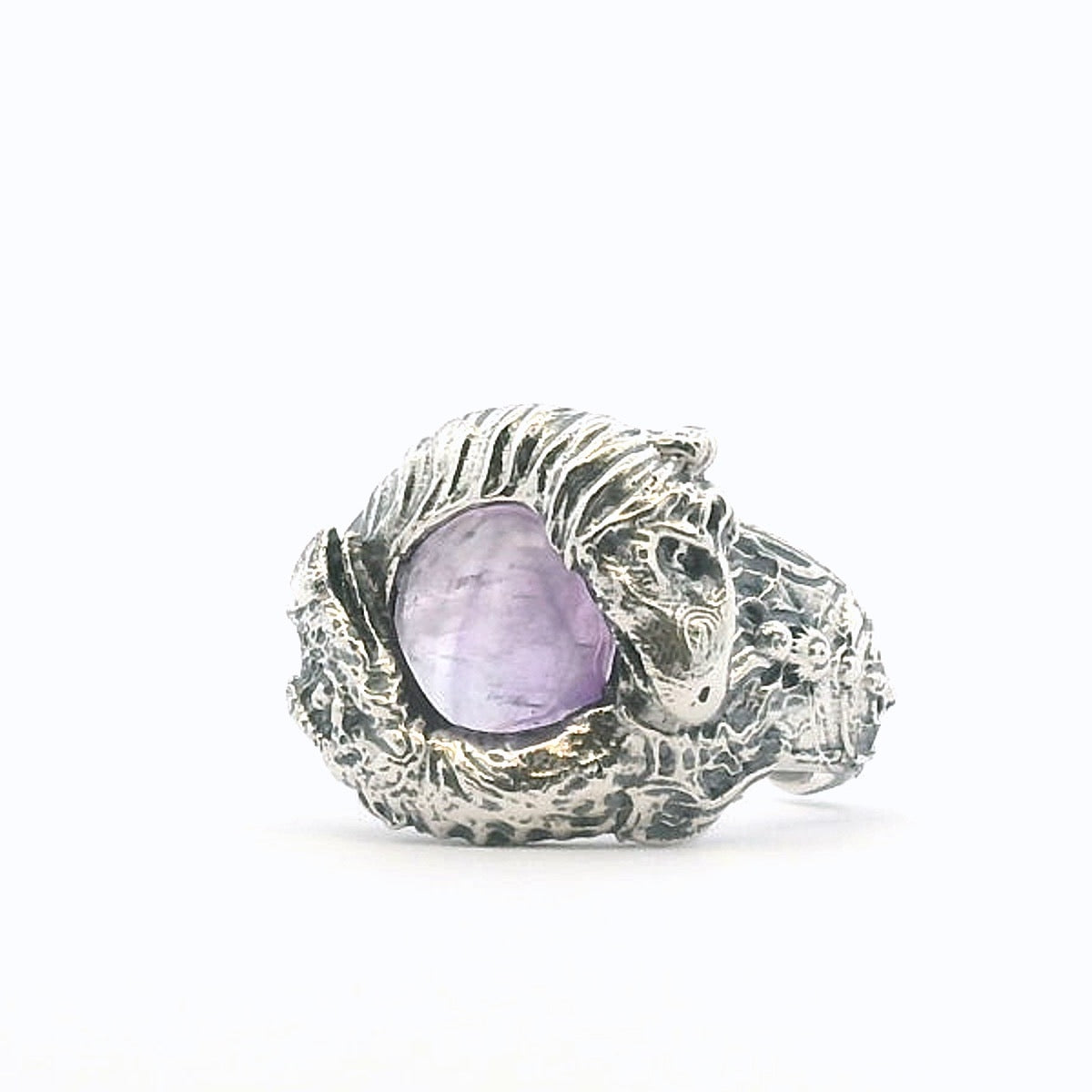 Close-up of Licensed To Charm Dark Crystal Skeksis & Mystic sterling silver ring with amethyst gemstone.