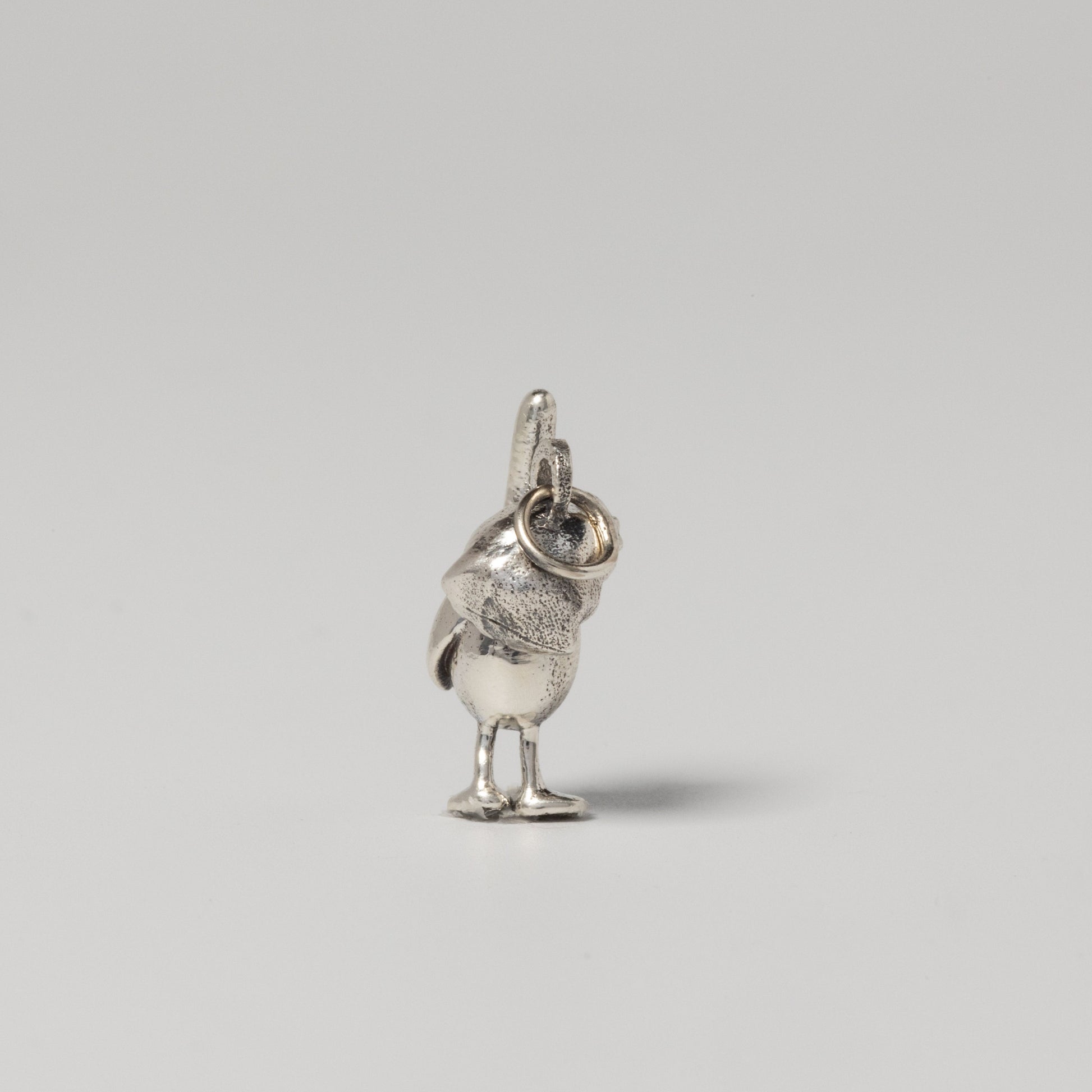 Feathers McGraw clip-on charm in sterling silver with lobster clasp for bracelets.