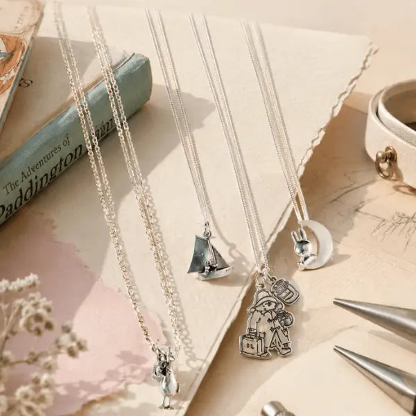 Licensed To Charm officially licensed sterling silver character jewellery featuring Miffy, Moomin, Paddington™ and Wallace & Gromit, styled together for the Forever Favourites collection.