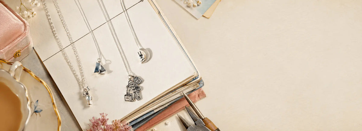 Licensed To Charm officially licensed sterling silver character jewellery featuring Miffy, Moomin, Paddington™ and Wallace & Gromit, styled together for the Forever Favourites collection.