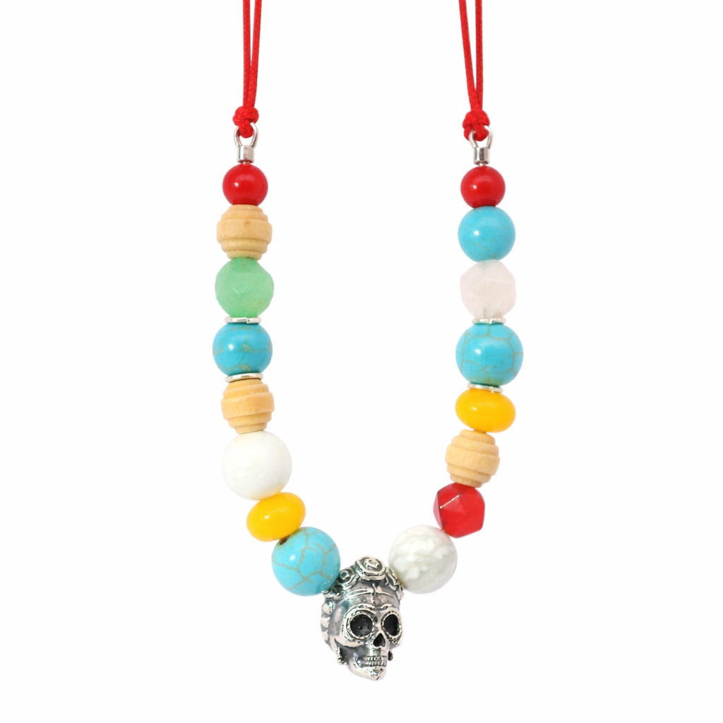 Full view of Licensed To Charm Frida Kahlo Beaded Sugar Skull Cord Necklace with red cord and colourful semi-precious beads