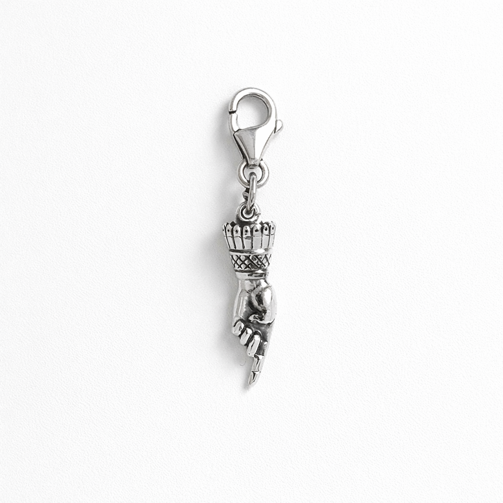 Licensed To Charm Frida Kahlo pointing hand charm in sterling silver with lobster clasp, back view on white background