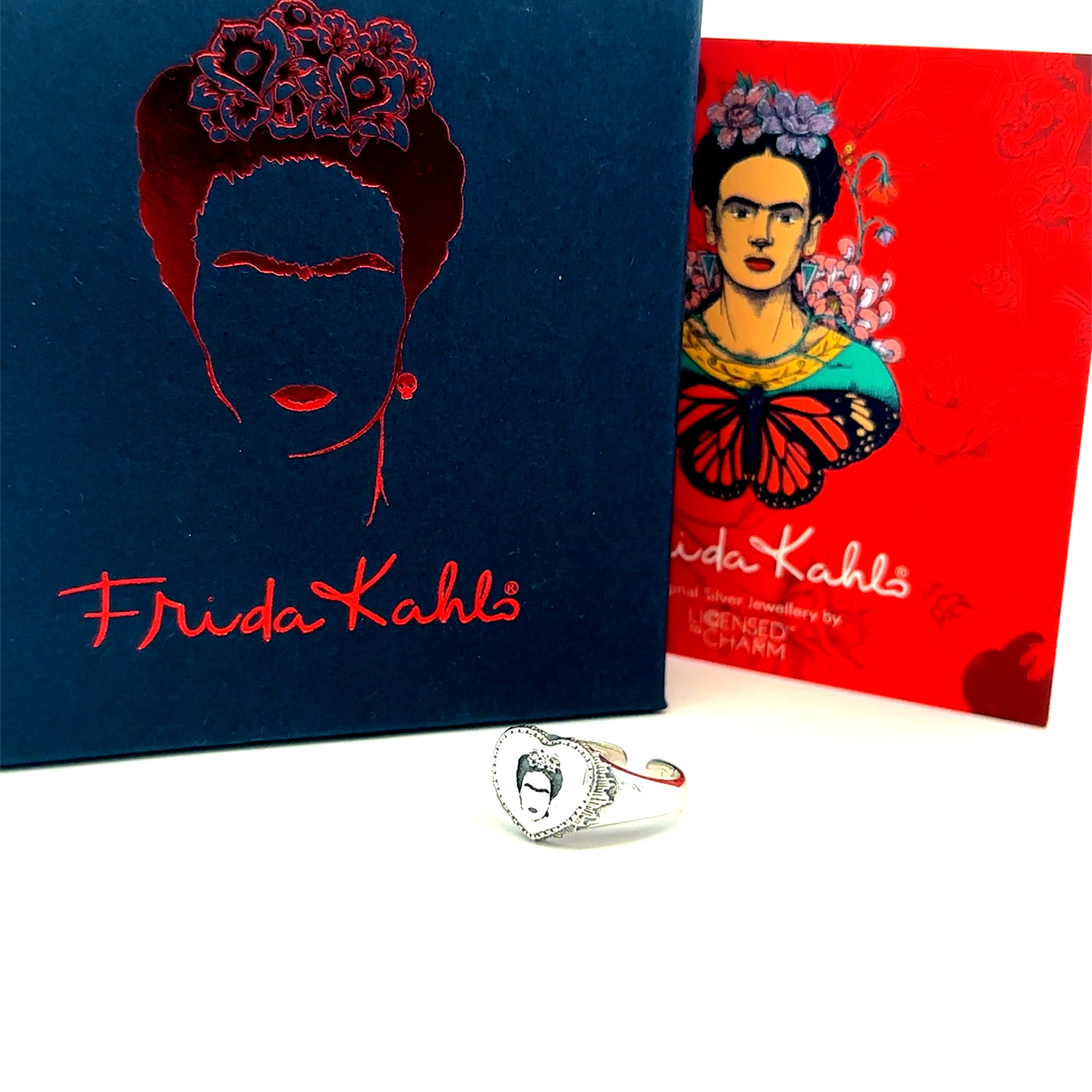 Sterling silver Frida Kahlo Viva La Vida Heart Ring shown with colourful official packaging by Licensed To Charm.