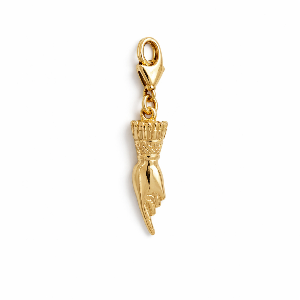 Licensed To Charm Frida-inspired pointing hand charm in gold vermeil with lobster clasp on a white background