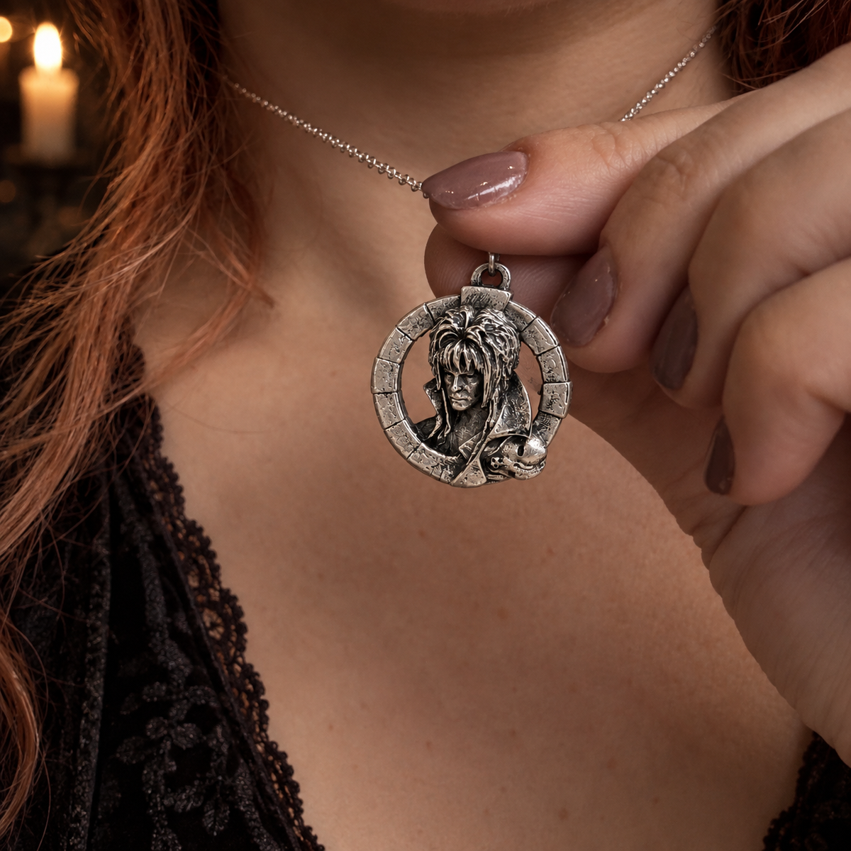 Labyrinth Jareth Goblin King sterling silver necklace held close up